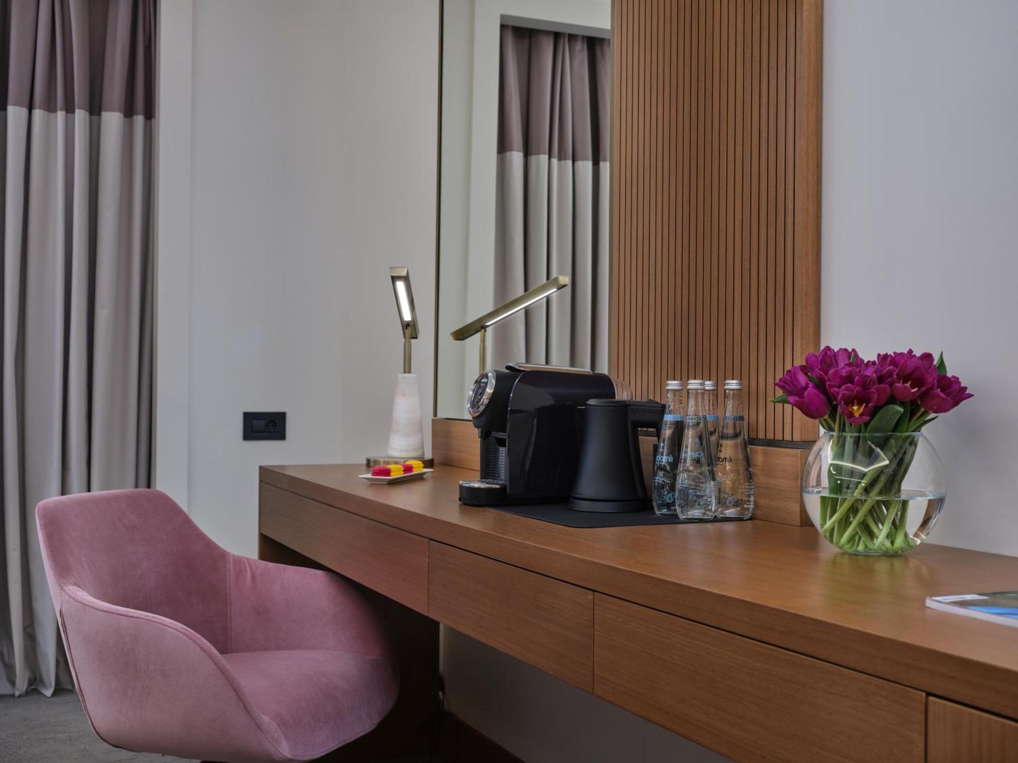 Qafqaz Riverside Hotel Gabala Exterior photo A Nespresso machine in a hotel room