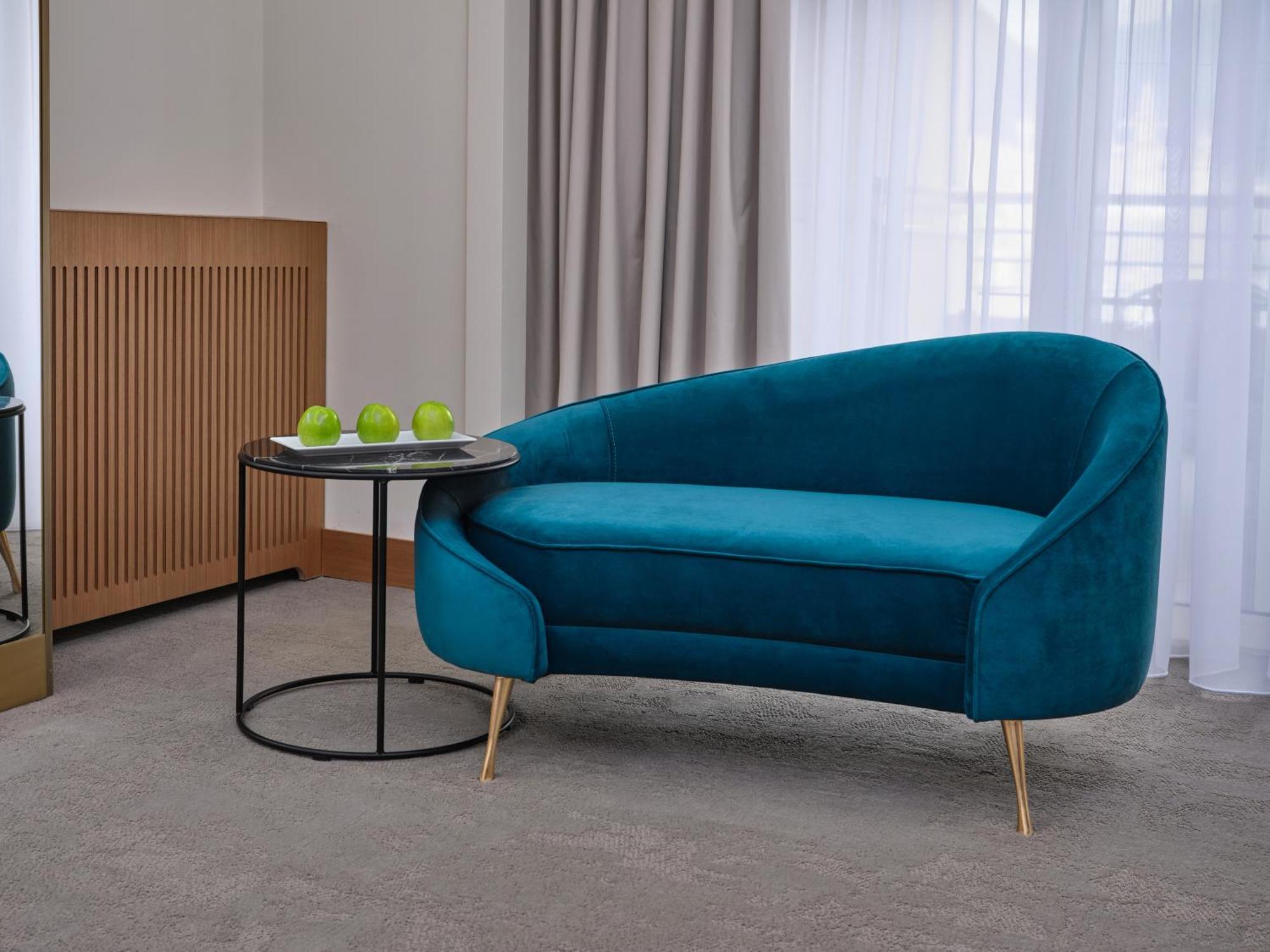 Qafqaz Riverside Hotel Gabala Exterior photo A sofa