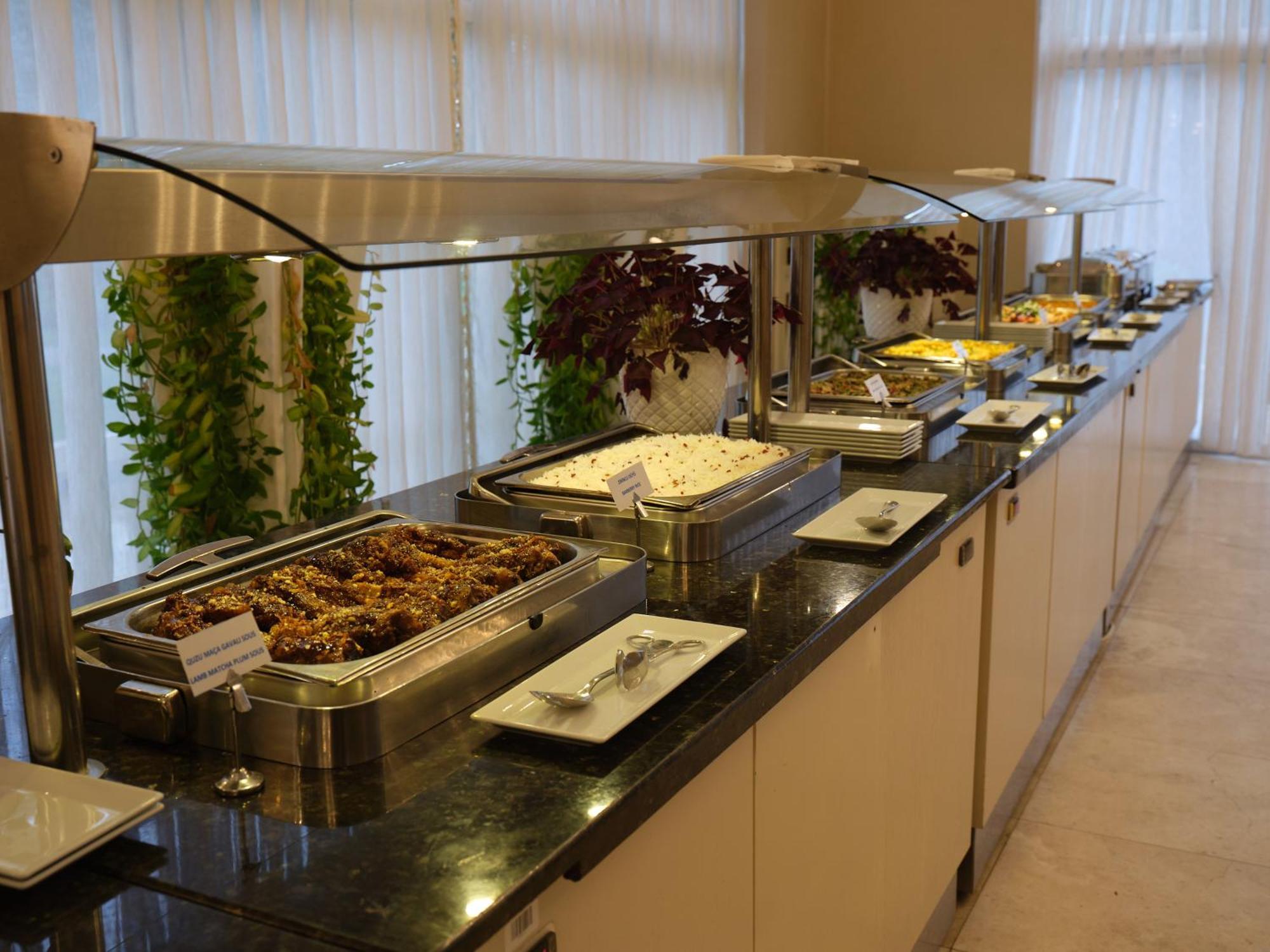 Qafqaz Riverside Hotel Gabala Exterior photo A buffet at a hotel